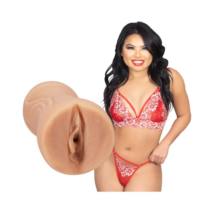 Vanilla-colored Ultraskyn pocket pussy next to smiling woman in red lace lingerie set