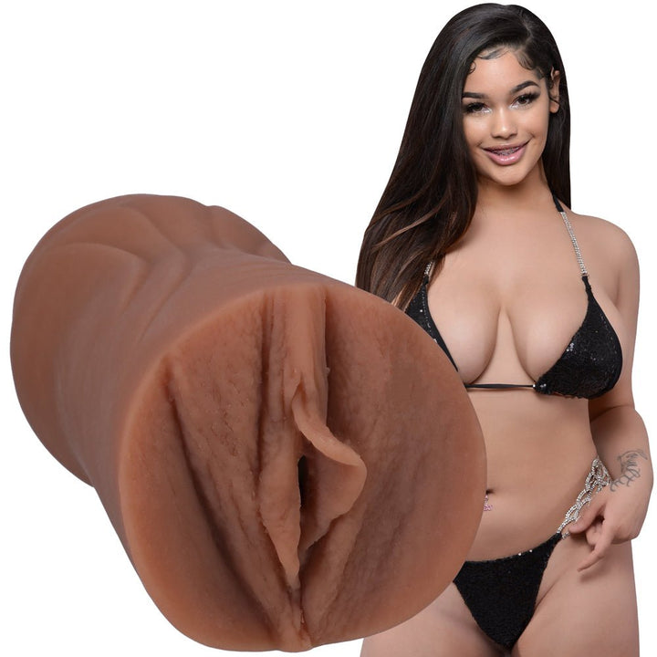Lifelike Ultraskyn pocket pussy modeled after social media influencer with inset image of woman in black bikini.