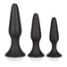 Three-piece black silicone anal trainer set with graduated sizes and flared bases for comfortable use.