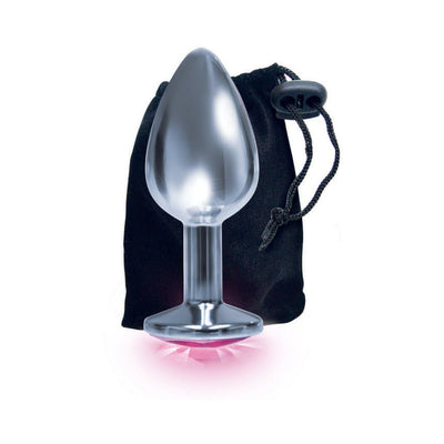 Silver stainless steel beginner plug with pink jewel base and black drawstring storage bag on white background