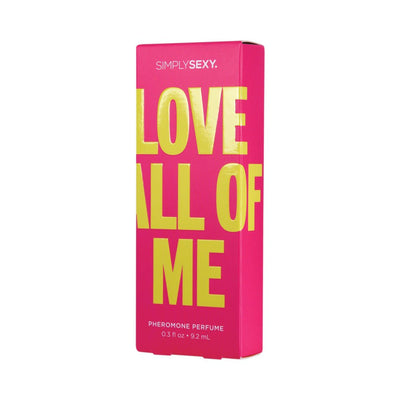 Bright pink box of Simply Sexy Love All Of Me pheromone perfume with bold yellow lettering and 0.3 fl oz size details.