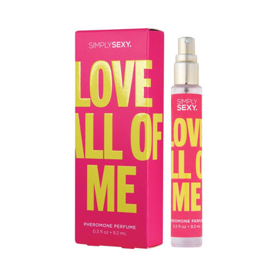 Simply Sexy Love All Of Me pheromone perfume spray with bright pink and yellow packaging, 0.3 fl oz bottle and box.