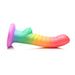 Rainbow-colored ribbed silicone dildo with suction base, 6.5 inches long, designed for versatile and comfortable use.