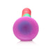 Colorful ribbed silicone dildo with suction cup base shown from the bottom on white background.