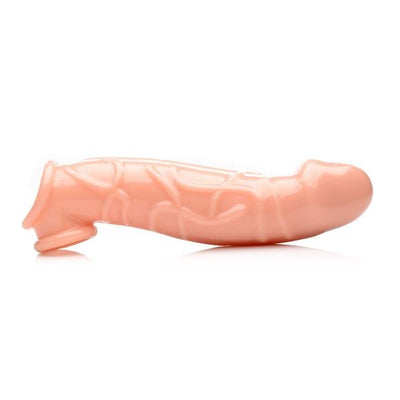 Beige 2-inch penis extender sleeve with realistic texture and curved shape, made from body-safe thermoplastic rubber.