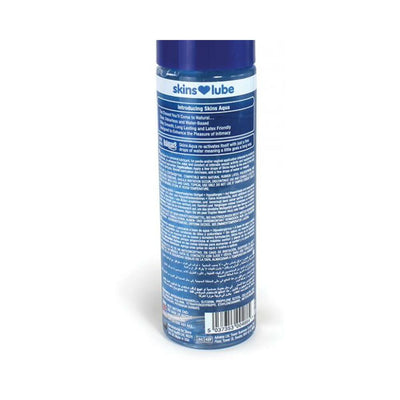 Back view of Skins Aqua water-based lubricant 4 oz bottle with detailed product information and blue cap.