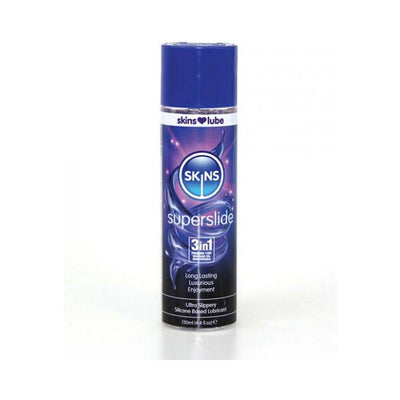 Bottle of Skins Superslide 4 oz silicone-based lubricant with blue and purple label and cap.
