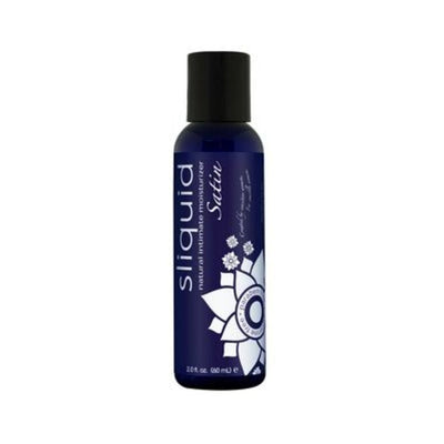 Sliquid Naturals Satin Personal Moisturizer in a 2 oz dark blue bottle with white floral design and black cap