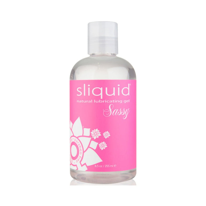 Sliquid Sassy natural lubricating gel in clear 8.5 oz bottle with pink label and white floral design