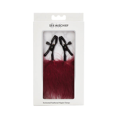 S&M Enchanted Feather Nipple Clamps in black with deep red feathers, packaged in a white box with clear window.