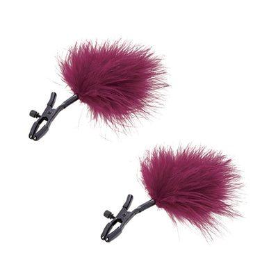 Pair of black adjustable nipple clamps with soft burgundy feather accents on a white background.