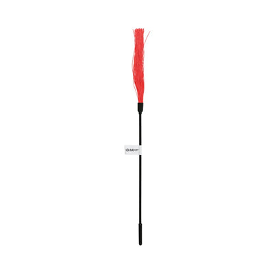 Sleek black handle with multiple thin red rubber strands for gentle tickling and sensory play.