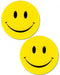 Pair of bright yellow smiley face pasties made from soft felt with black eyes and smiling mouth design.