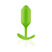 Green seamless silicone weighted plug with flexible neck and curved base for comfortable use.