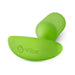 Green b-Vibe Weighted Snug Plug 3 made of smooth silicone with a curved base and ergonomic design.