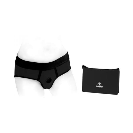 Black nylon Tomboi briefs harness with O-ring detail and matching black zip pouch on white background.
