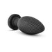 Small carbon fiber textured silicone plug with tapered tip and suction cup base on white background.