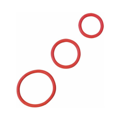 Set of three red rubber cock rings in varying sizes displayed on a white background.
