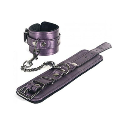 Purple faux leather ankle restraints with adjustable buckles and connecting metal chain clasp