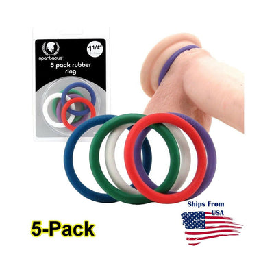 Spartacus 5-pack nitrile cock rings in assorted colors with packaging and a demonstration on a model.