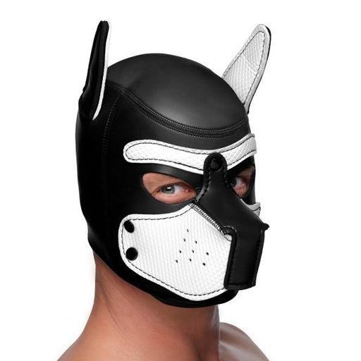 Man wearing a black and white neoprene puppy hood with quilted ears and detachable muzzle showing eyes and nose.