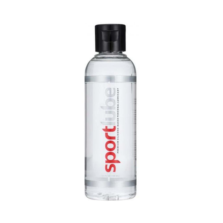 Clear 3.4 oz bottle of Sportlube silicone-based personal lubricant with black flip cap and red and gray label text.