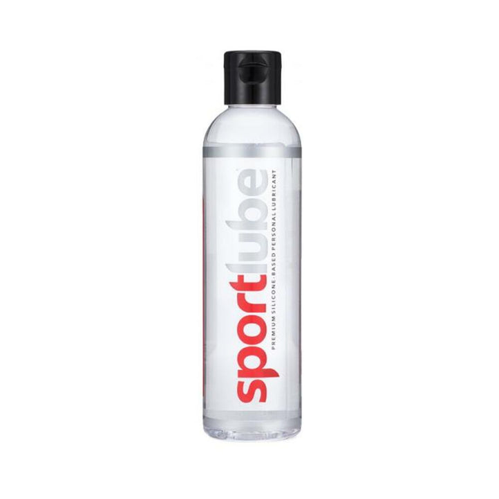 Clear bottle of Sportlube silicone-based personal lubricant with black flip-top cap and red and gray label text.
