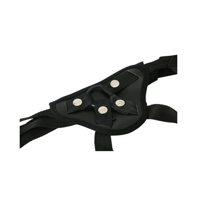 Close-up of black adjustable strap-on harness with metal snaps and durable webbing material.