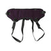 Purple plush strap-on harness with adjustable black straps and buckles for a customizable fit.