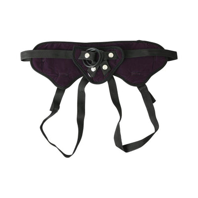 Purple plush strap-on harness with adjustable black straps and interchangeable O-ring attachments.