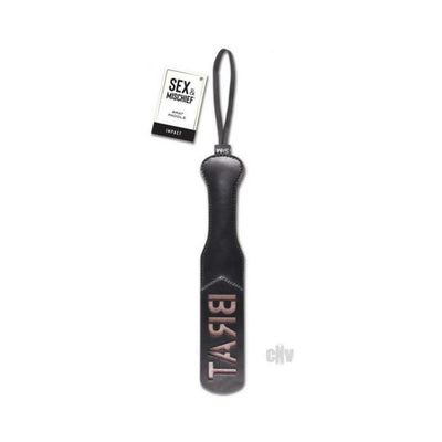 Black faux leather paddle with wrist loop and "BRAT" embossed on the striking surface, labeled Sex & Mischief.