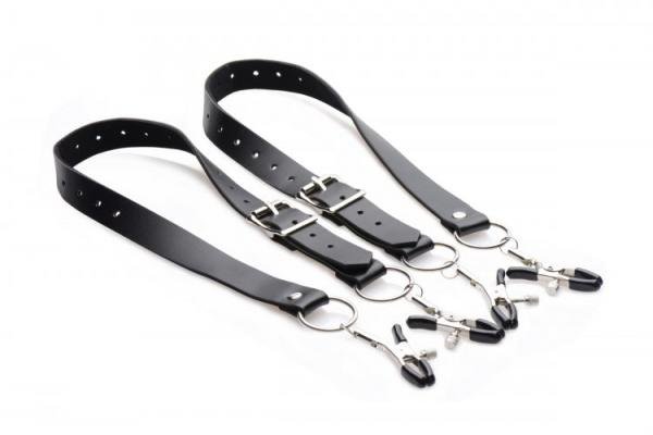 Black adjustable labia spreader straps with metal clamps and buckles on a white background.