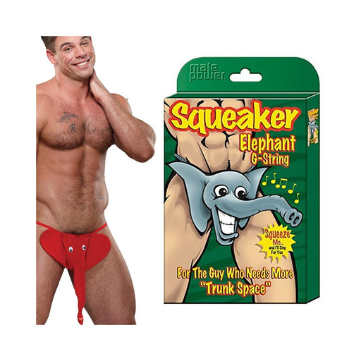 Man wearing red elephant-themed G-string with large ears and trunk detail next to its colorful packaging box.