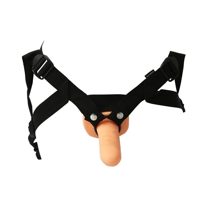 Black adjustable strap-on harness with a flesh-toned hollow silicone dildo attached.