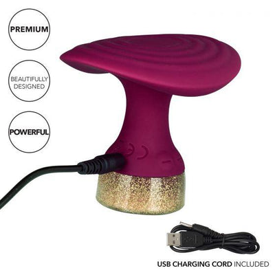 Starstruck Fantasy handheld vibrator in deep purple with glitter base and USB charging cord included.