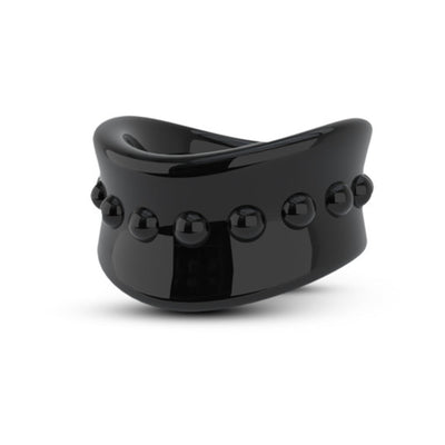 Black glossy scrotum ring with raised bead detailing, designed for comfortable stretching and enhanced sensation.
