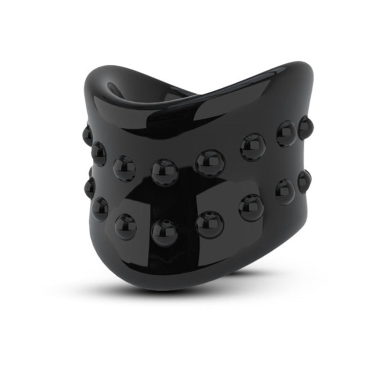Glossy black scrotum stretcher ring with textured raised nodules for enhanced sensation and comfort.