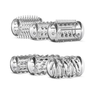 Six clear textured cock sleeves with varied raised patterns for enhanced sensation, displayed on a white background.