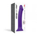 Purple dual density bendable silicone dildo XL with suction base shown on product packaging box.