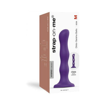 Purple Strap On Me Geisha dildo with three responsive balls, ergonomic shape, and suction base in medium size packaging.