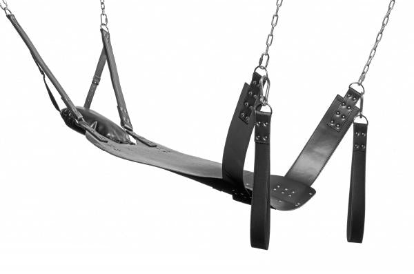 Black leather bondage sling with padded pillow, adjustable straps, and detachable stirrups suspended by metal chains.