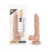 Realistic flesh-toned dildo with suction cup base shown in and out of clear packaging labeled Dr. Skin Stud Muffin.