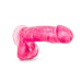 Purple translucent beginner dildo with suction cup base and realistic texture and details.
