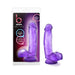 Purple translucent dildo with suction cup base shown next to its branded packaging.