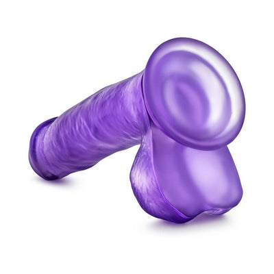 Purple translucent beginner dildo with suction cup base and realistic texture details.