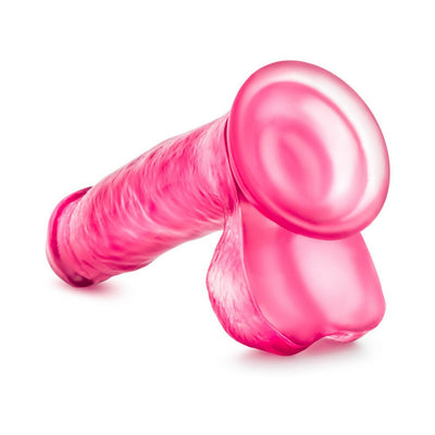 Transparent pink beginner-friendly dildo with suction cup base and realistic texture details.