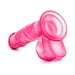 Transparent pink beginner-friendly dildo with suction cup base and realistic texture details.