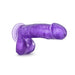 Purple translucent dildo with suction cup base and realistic texture and details.