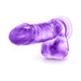 Purple translucent dildo with suction cup base and detailed textured design.