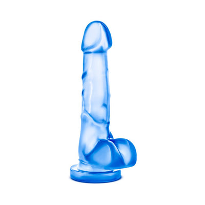 Translucent blue realistic dildo with suction cup base standing upright on white background